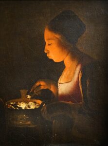 Georges de La Tour, A Girl Blowing on a Brazier, c 1647 Oil on canvas, 29.9 x 21.6 in Louvre Abu Dhabir